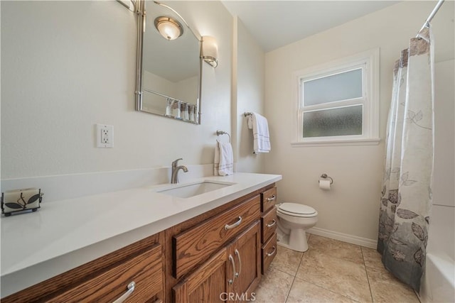 full bathroom with toilet, tile patterned flooring, vanity, and baseboards