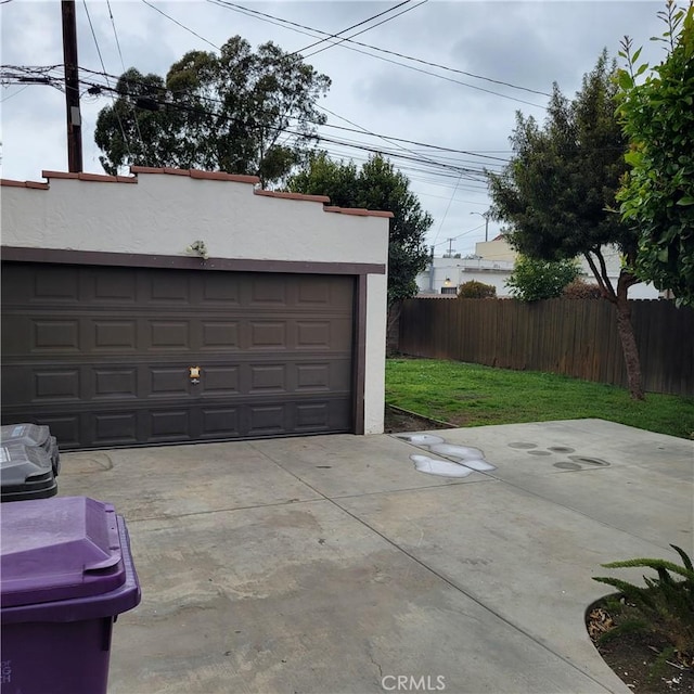 garage with fence