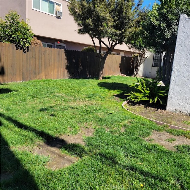 view of yard featuring fence