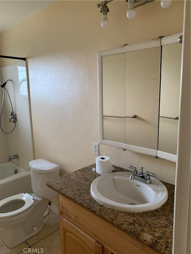 bathroom featuring vanity, shower / tub combination, tile patterned flooring, and toilet