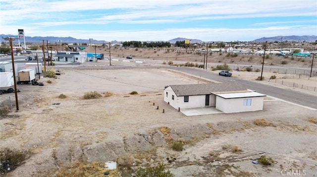 drone / aerial view featuring a mountain view