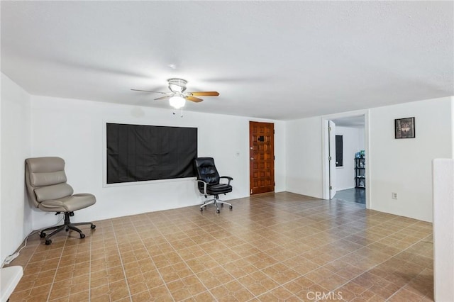 interior space featuring ceiling fan