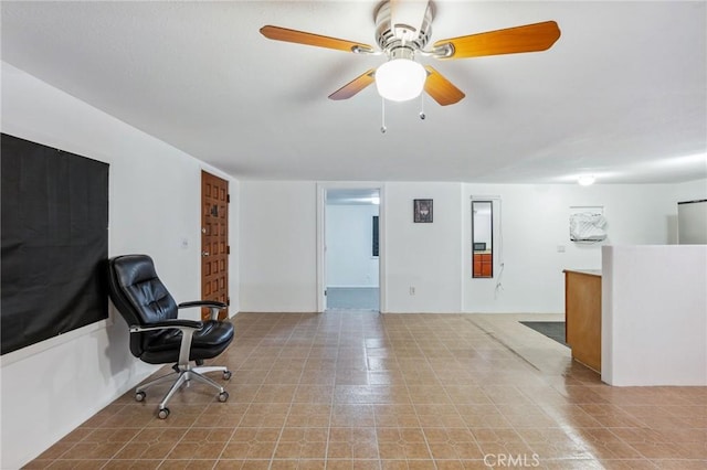 interior space with a ceiling fan