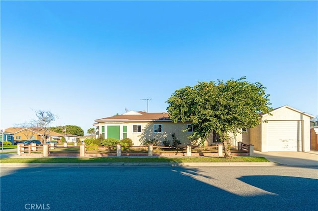 view of front of house featuring an attached garage and stucco siding