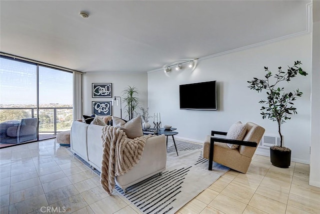 living room with light tile patterned floors, visible vents, baseboards, a wall of windows, and crown molding