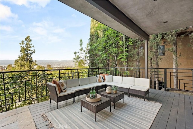 deck featuring outdoor lounge area