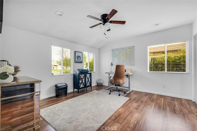 office area with vaulted ceiling, baseboards, and wood finished floors