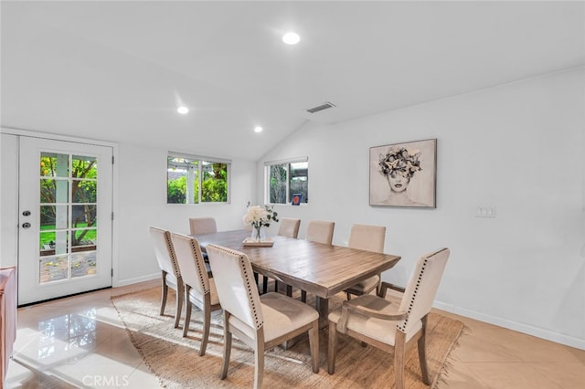 dining room with recessed lighting, baseboards, visible vents, vaulted ceiling, and light tile patterned flooring