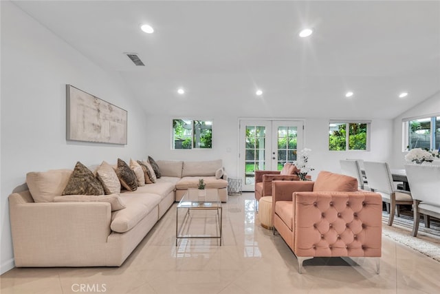 living room with lofted ceiling, french doors, visible vents, and recessed lighting