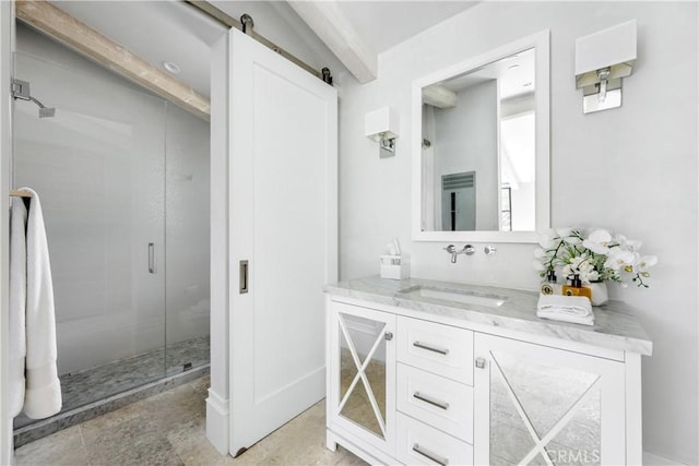 full bathroom featuring a shower stall and vanity