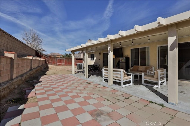 view of patio with a fenced backyard and an outdoor hangout area