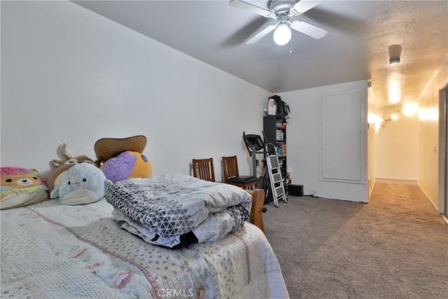 carpeted bedroom with a ceiling fan