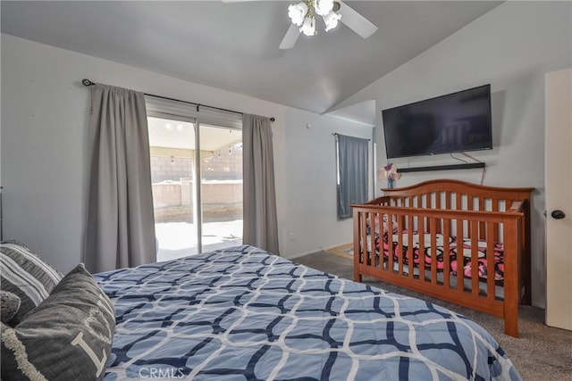 bedroom with carpet floors, lofted ceiling, and ceiling fan