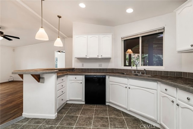 kitchen with a ceiling fan, black dishwasher, a sink, and a peninsula