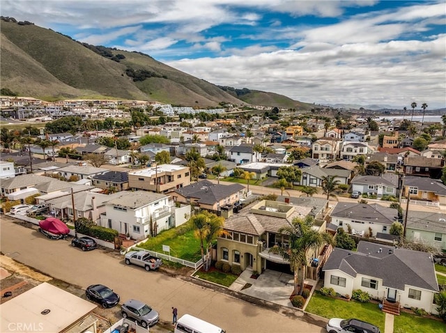 birds eye view of property featuring a mountain view and a residential view