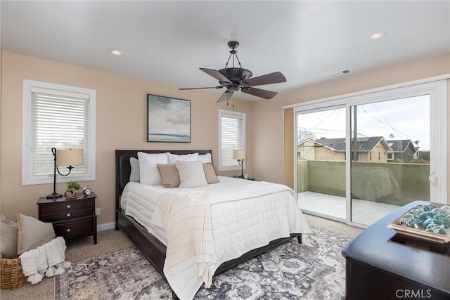 bedroom featuring visible vents, carpet floors, baseboards, recessed lighting, and access to exterior