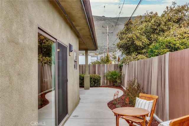 view of patio / terrace with fence