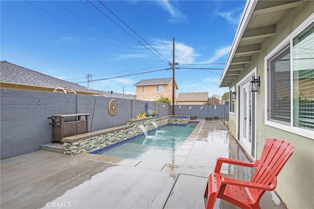 view of swimming pool featuring a patio area, a fenced in pool, and a fenced backyard