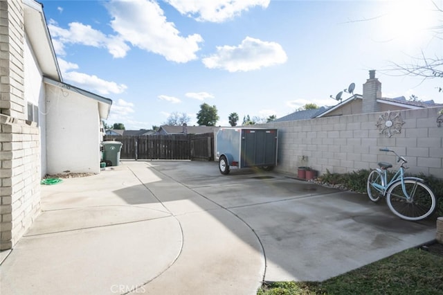 view of patio featuring fence