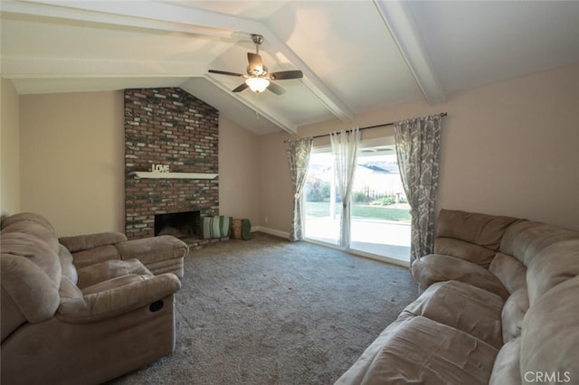 carpeted living room with vaulted ceiling with beams, a brick fireplace, and a ceiling fan