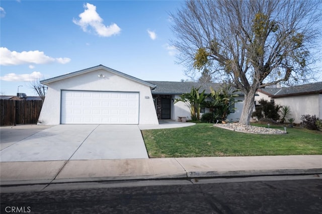 ranch-style house featuring an attached garage, fence, concrete driveway, stucco siding, and a front yard