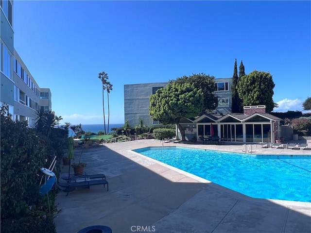 pool with a patio