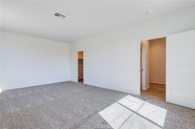 12990 Campbell Ct, Hesperia, CA 92344 - empty room with carpet floors and visible vents
