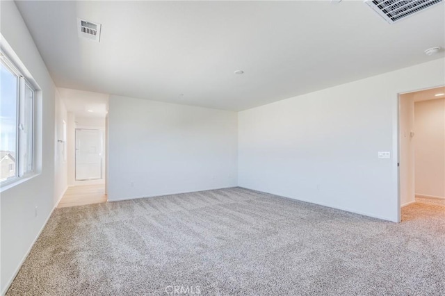 12990 Campbell Ct, Hesperia, CA 92344 - spare room featuring visible vents and light colored carpet