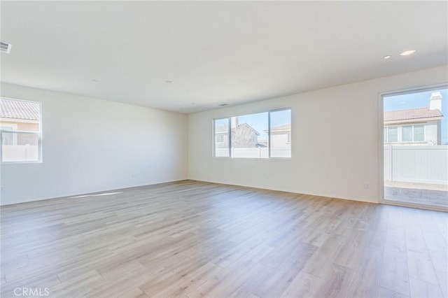 12990 Campbell Ct, Hesperia, CA 92344 - spare room featuring light wood-type flooring and visible vents