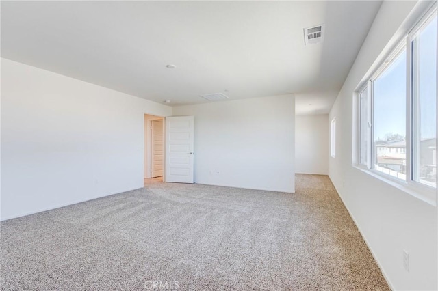 12990 Campbell Ct, Hesperia, CA 92344 - unfurnished room featuring visible vents and light colored carpet