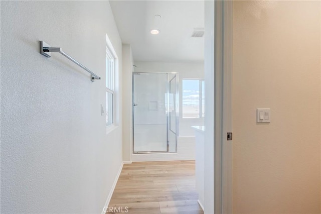 12990 Campbell Ct, Hesperia, CA 92344 - hallway featuring light wood-type flooring and baseboards