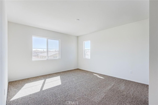 12990 Campbell Ct, Hesperia, CA 92344 - carpeted spare room featuring baseboards