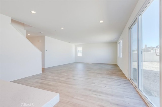 12990 Campbell Ct, Hesperia, CA 92344 - empty room with light wood-style floors and recessed lighting