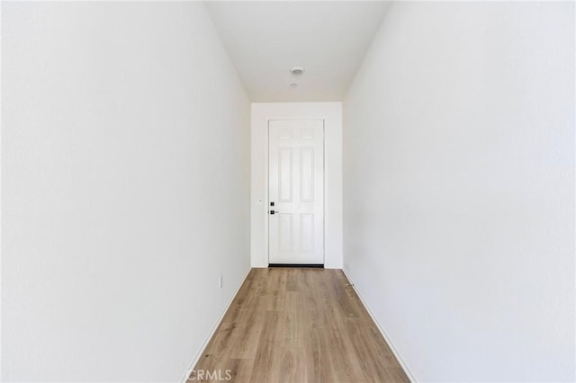 hall featuring light wood-style flooring