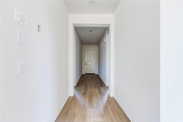 hall featuring light wood-style flooring