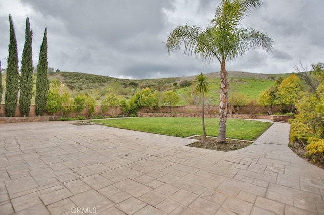 view of patio with a mountain view