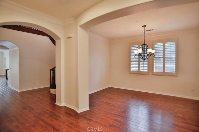 unfurnished room with arched walkways, crown molding, visible vents, dark wood-type flooring, and stairs