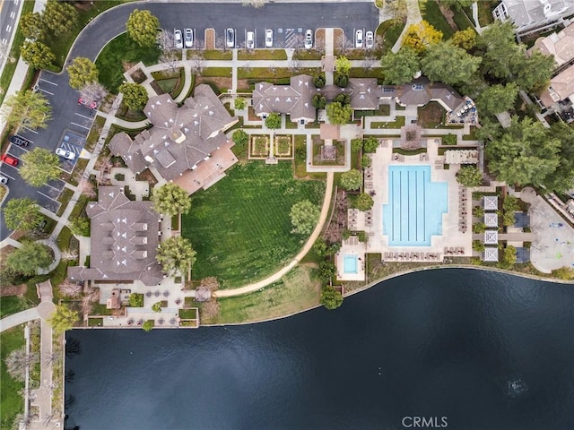 birds eye view of property featuring a water view