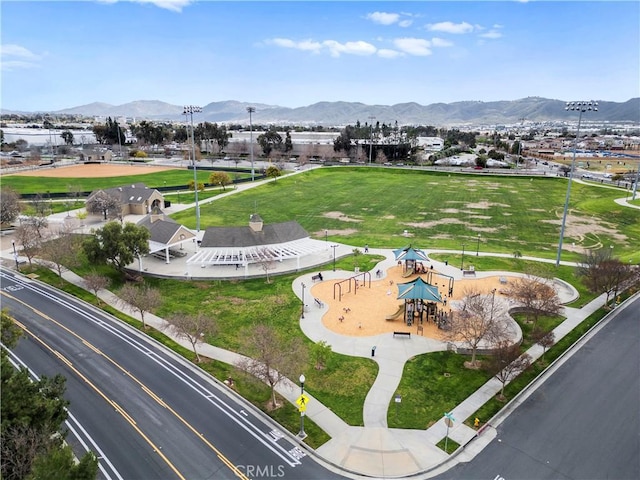 birds eye view of property featuring a mountain view