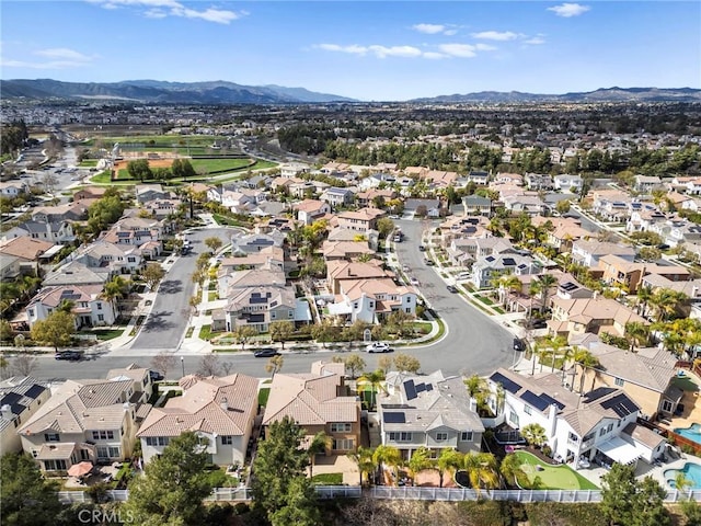 drone / aerial view featuring a mountain view and a residential view