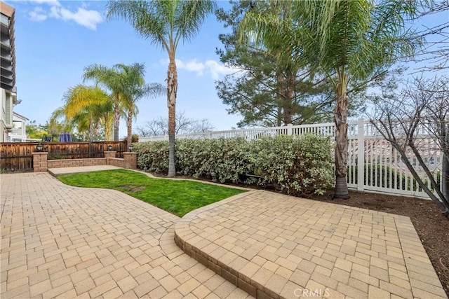 view of patio featuring a fenced backyard