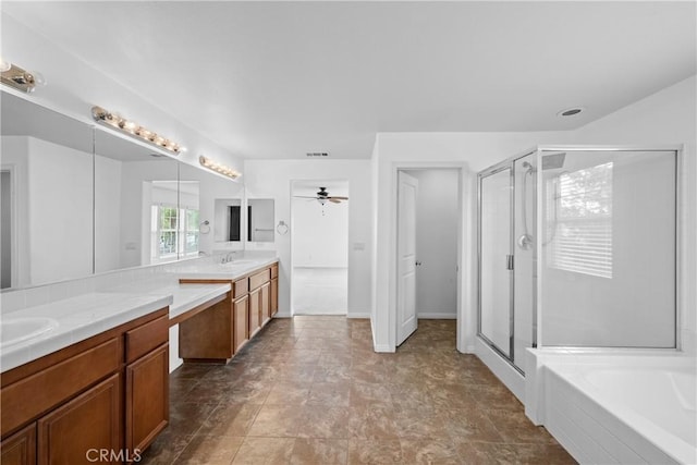 bathroom with visible vents, vanity, a ceiling fan, a shower stall, and a bath