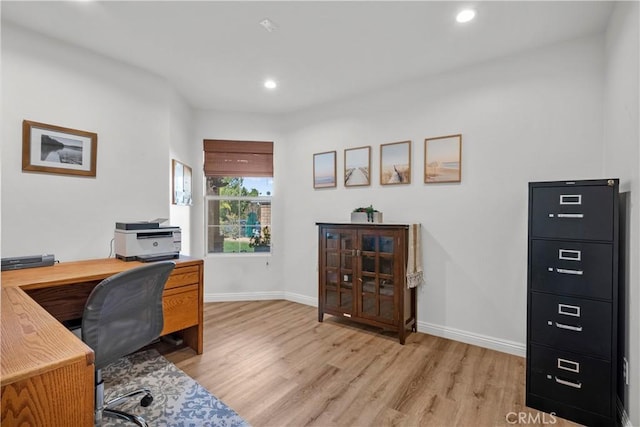 office area featuring recessed lighting, light wood-style flooring, and baseboards