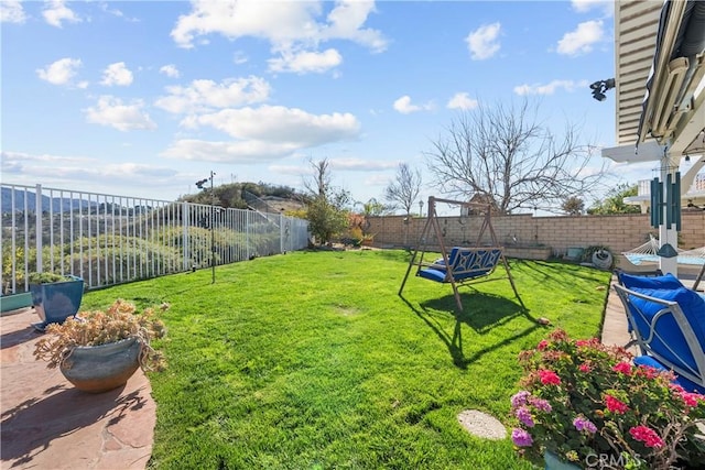 view of yard featuring a fenced backyard