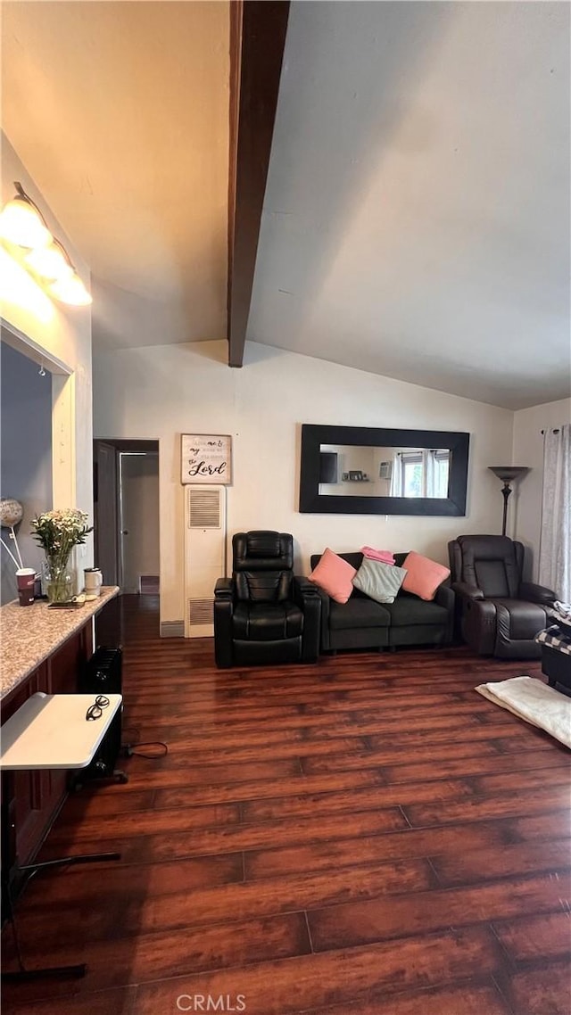 living area featuring lofted ceiling with beams and dark wood-style floors