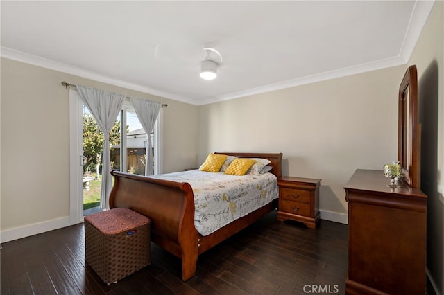 bedroom with ornamental molding, wood-type flooring, and baseboards