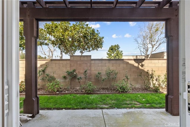 exterior space featuring fence and a pergola