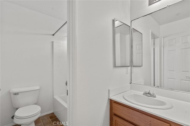 bathroom with  shower combination, baseboards, vanity, and toilet