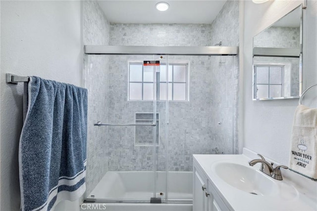 bathroom with vanity and an enclosed shower