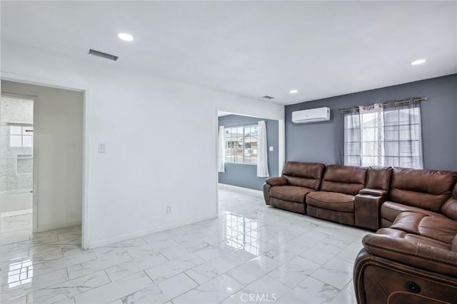 living area with marble finish floor, recessed lighting, visible vents, an AC wall unit, and baseboards